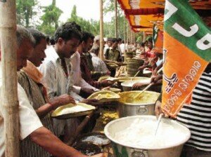 BJP offers free food to poor villagers as part of a public kitchen campaign BJP offers free food to poor villagers as part of a public kitchen campaign