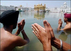 Sikhs praying at the Golden Temple