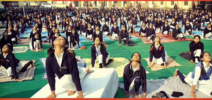 Hindu Kids at school doing Yoga in India is common