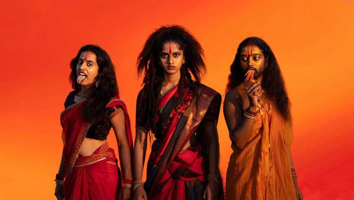 Goddess Chamunda, the raw and untamed manifestation of Durga, stands surrounded by birds and beasts, holding the decapitated heads of Chanda and Munda in her hands