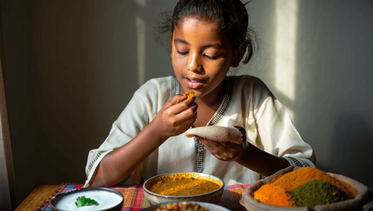 Psychology says the way you eat with your hands may reveal your connection to your roots etimes.in / Jun 18, 2026, 07:23 (IST) Eating with hands, a practice deeply rooted in cultures like India, Ethiopia, and the Middle East, fosters a stronger connection to food through multisensory integration. This tradition enhances emotional comfort, reinforces cultural identity, and promotes mindful eating by demanding presence and awareness during meals, ultimately enriching the dining experience.