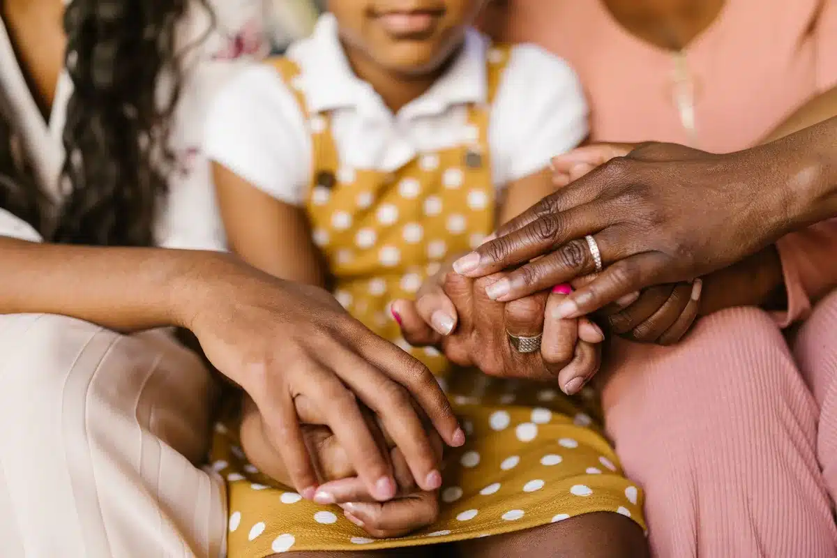 Diverse hands joined together symbolizing multicultural and multi-faith unity and harmony