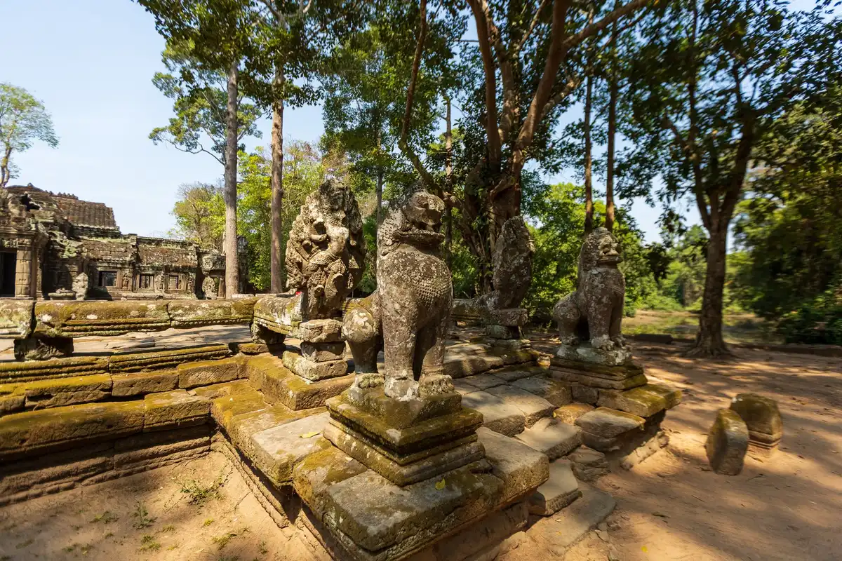 Weathered stone temple ruins with carved details showing age and historical significance