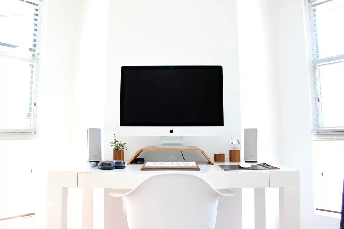 Person sitting comfortably in a chair at home, relaxed posture